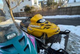 2001 Skidoo MXZ, 1996 Arctic Cat JAG, and trailer