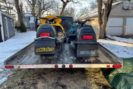 2001 Skidoo MXZ, 1996 Arctic Cat JAG, and trailer