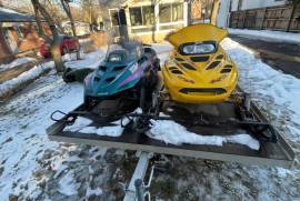 2001 Skidoo MXZ, 1996 Arctic Cat JAG, and trailer